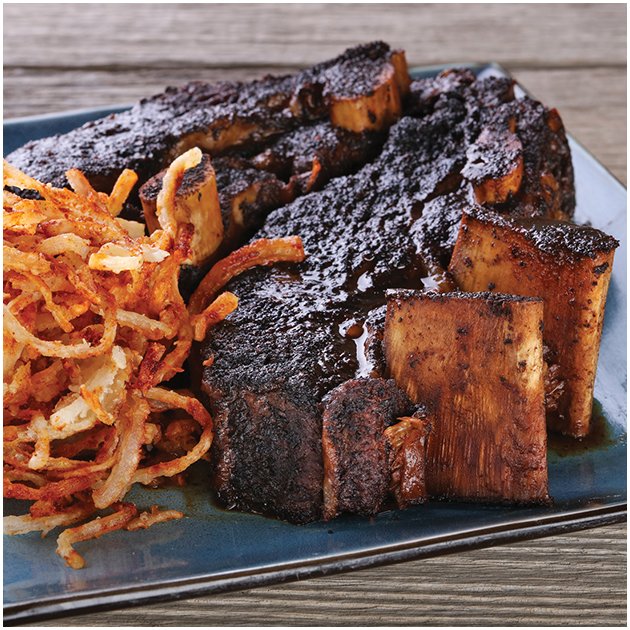 Beef back ribs on serving plate