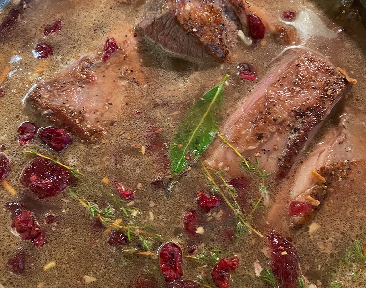 Cranberry-braised beef ribs