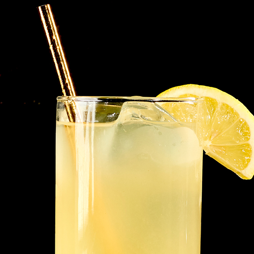 Nonalcoholic Pineapple Cooler with lime juice, pineapple juice and ginger syrup.